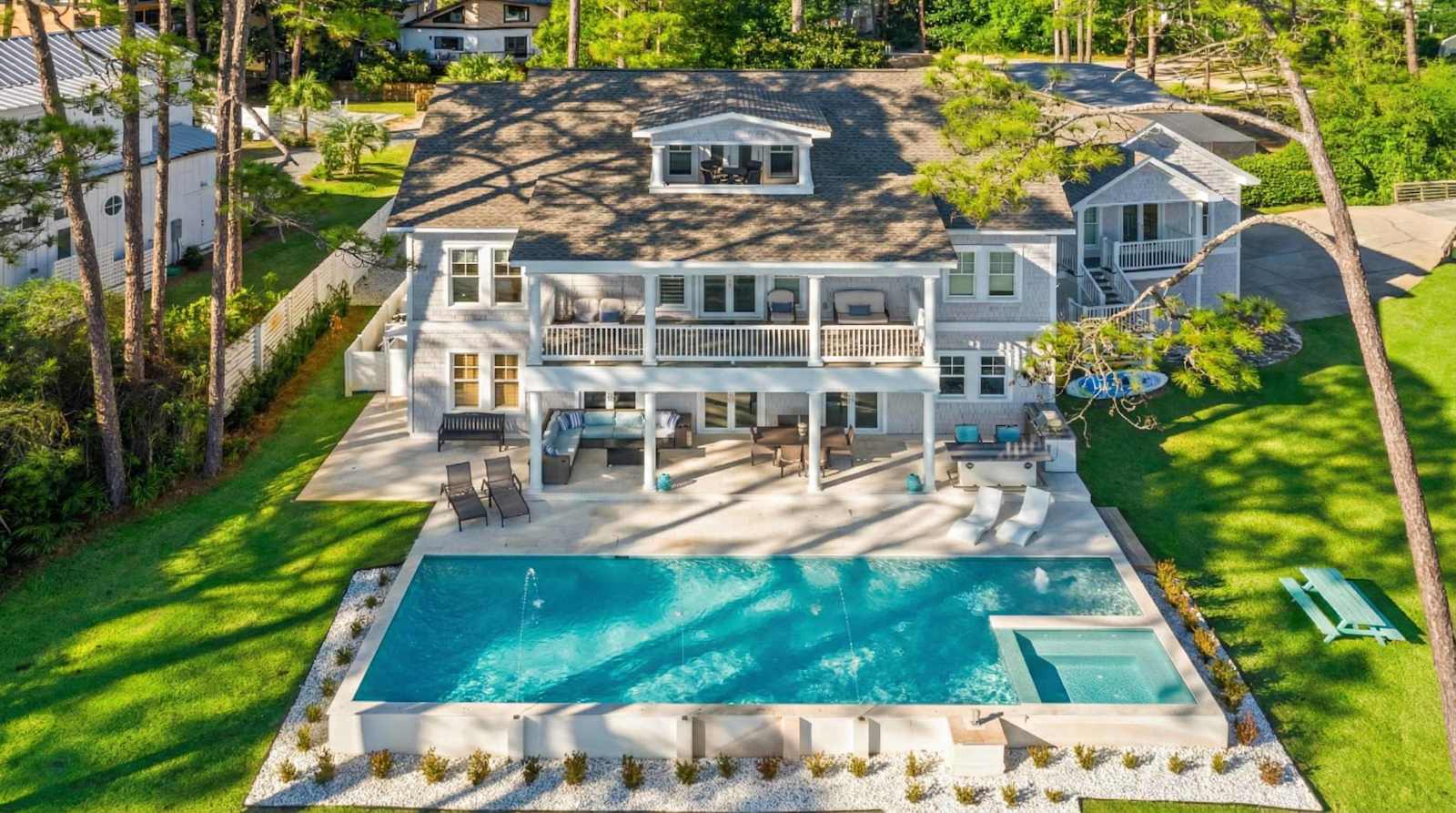 A luxury pool and outdoor area at a Portoro-managed home